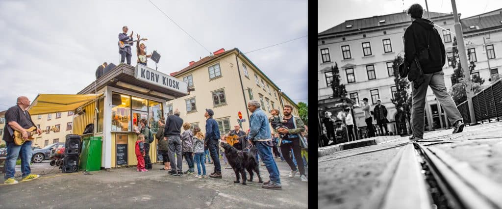 Ett gatufoto där människor står i kö i en stadsmiljö.