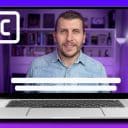 En bild på en laptop med en man i jeansskjorta. Texten CC står i en ruta intill.